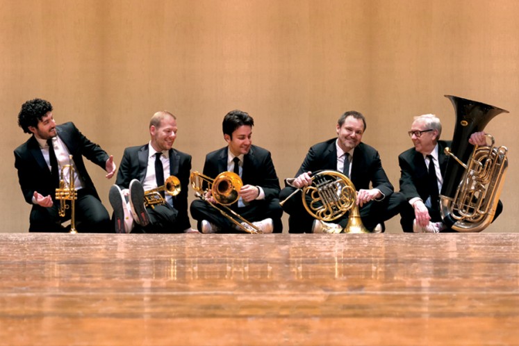 Canadian Brass group photo on stage with instruments